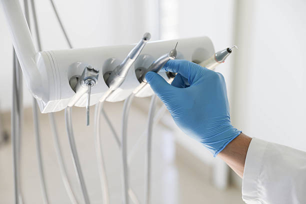 Professional Tooth Extraction technician working in Chattanooga, TN